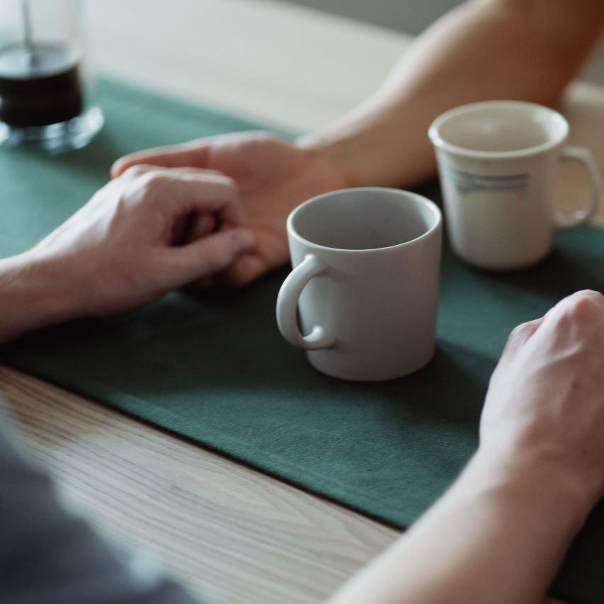 hand-holding-over-coffee