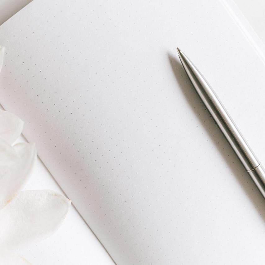 pen-on-paper-with-flowers