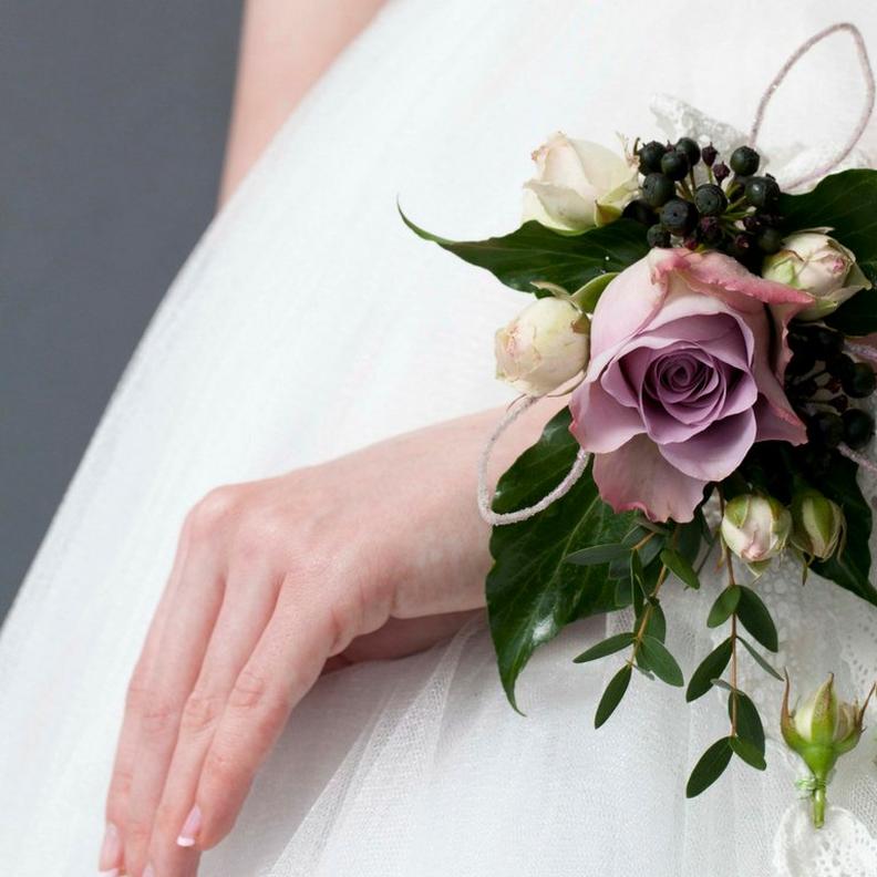 rose-corsage-on-bride